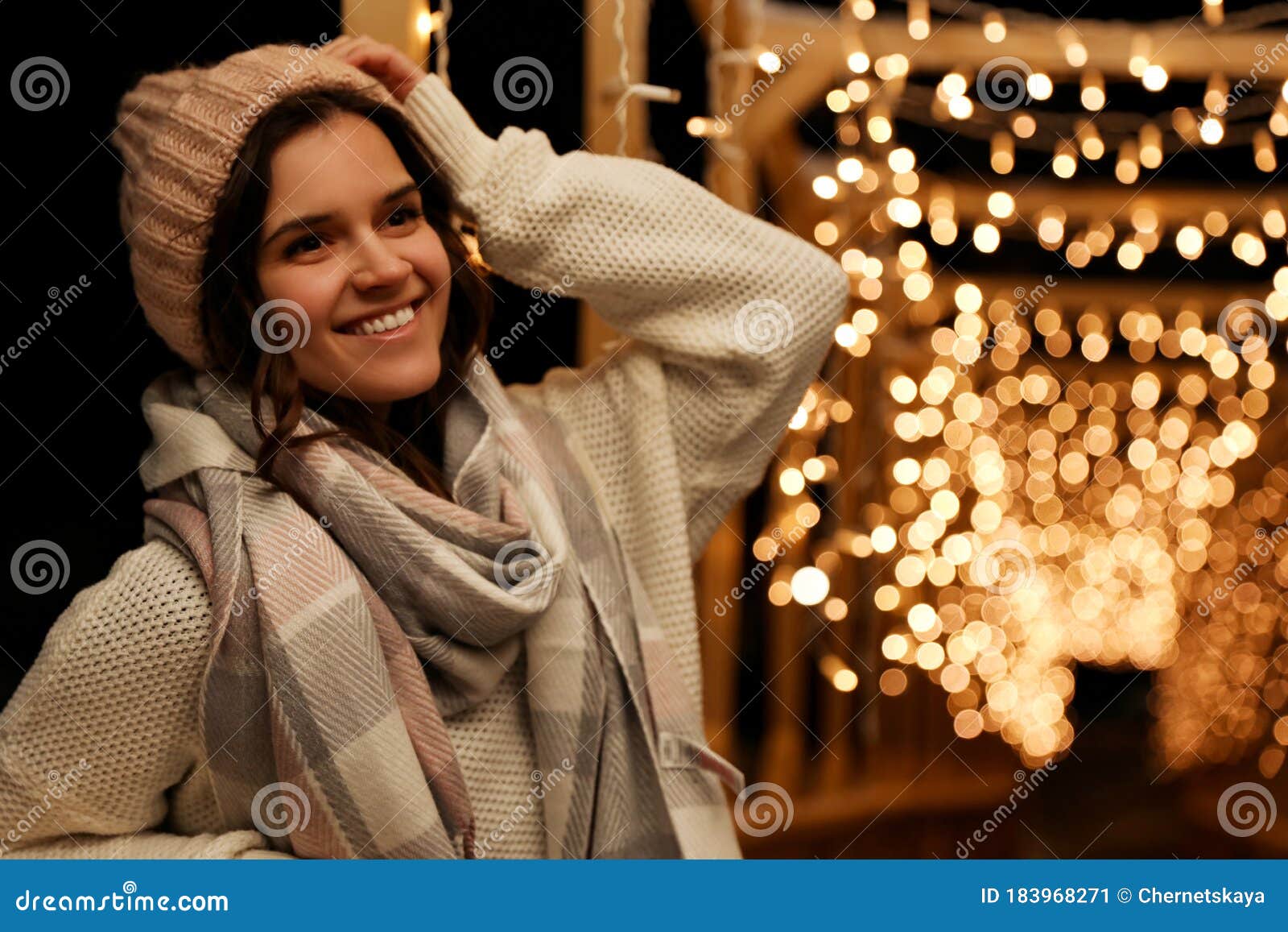Woman Wearing Warm Sweater, Hat and Scarf Outdoors at Night. Winter ...