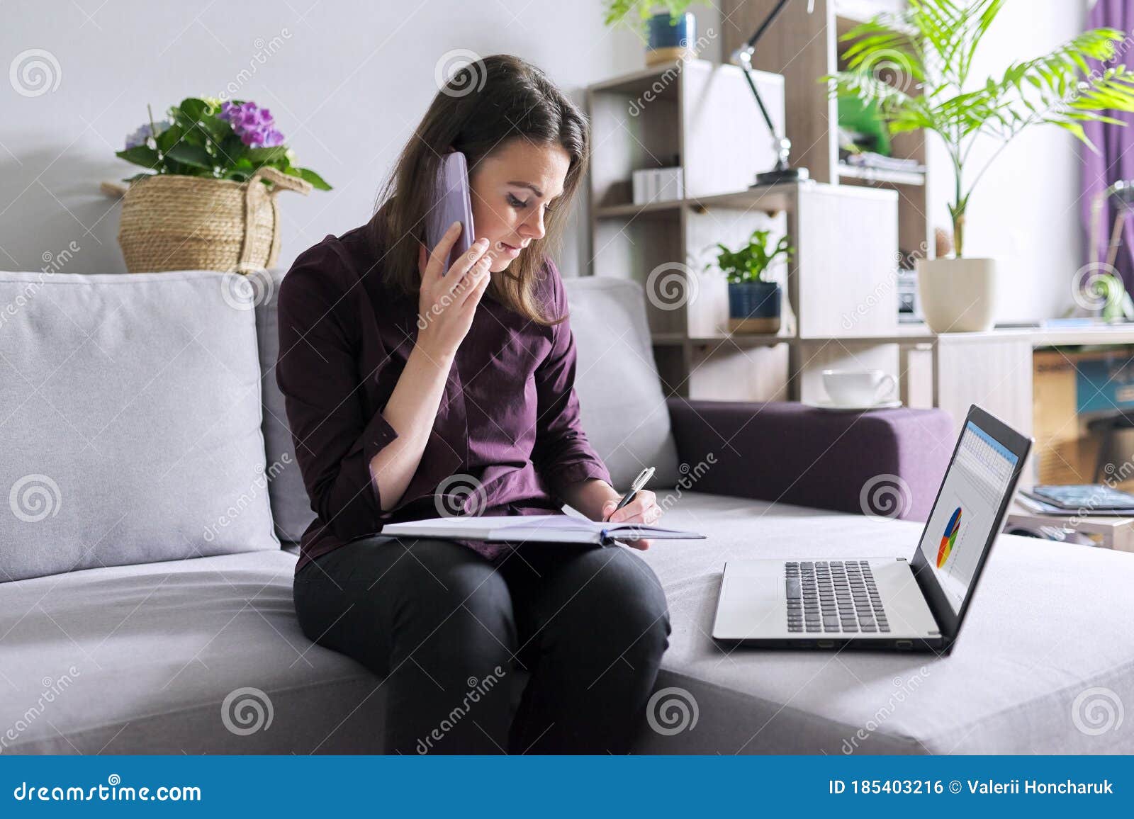 young woman working remotely at home, business female freelancer