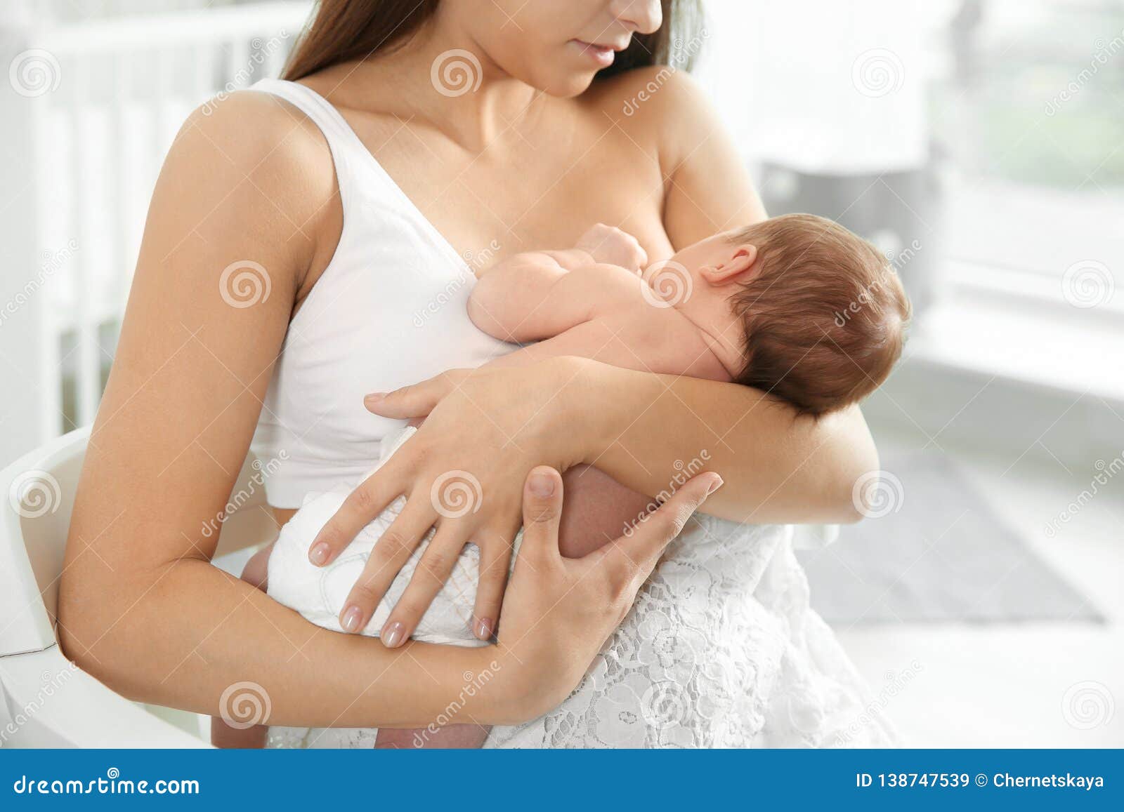 wife lacting her baby