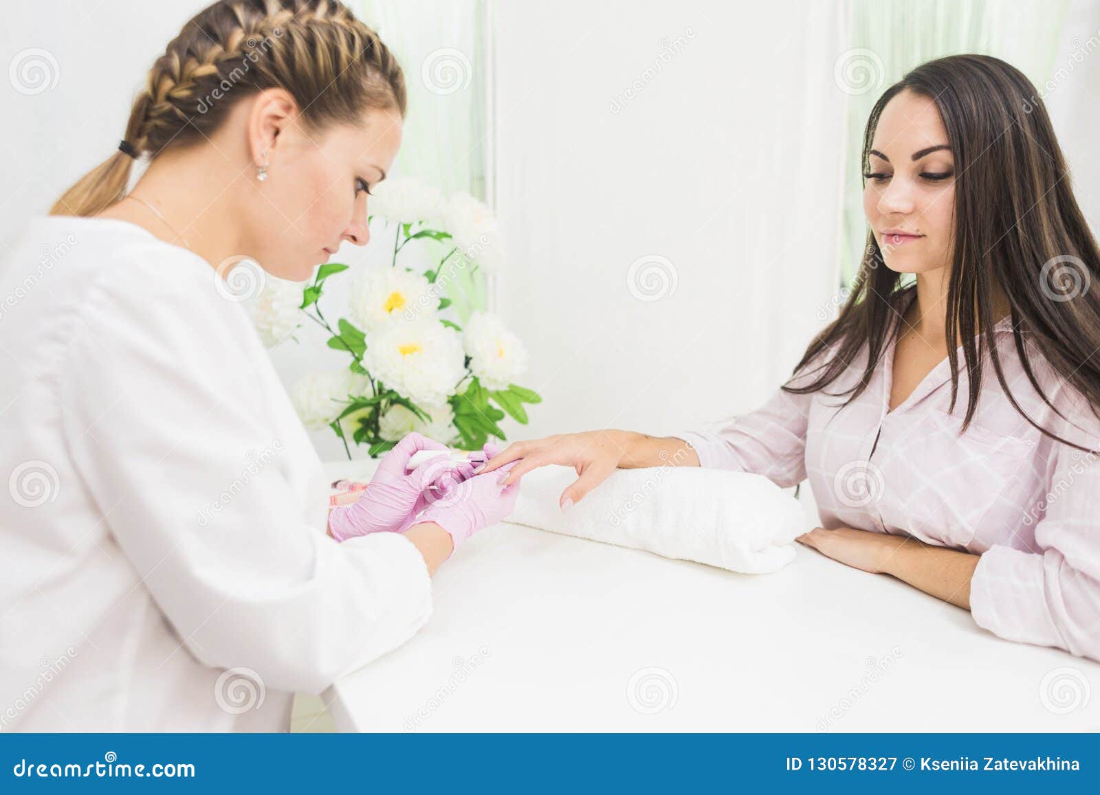 Young Woman Getting Manicure in Beauty Salon Stock Image - Image of ...