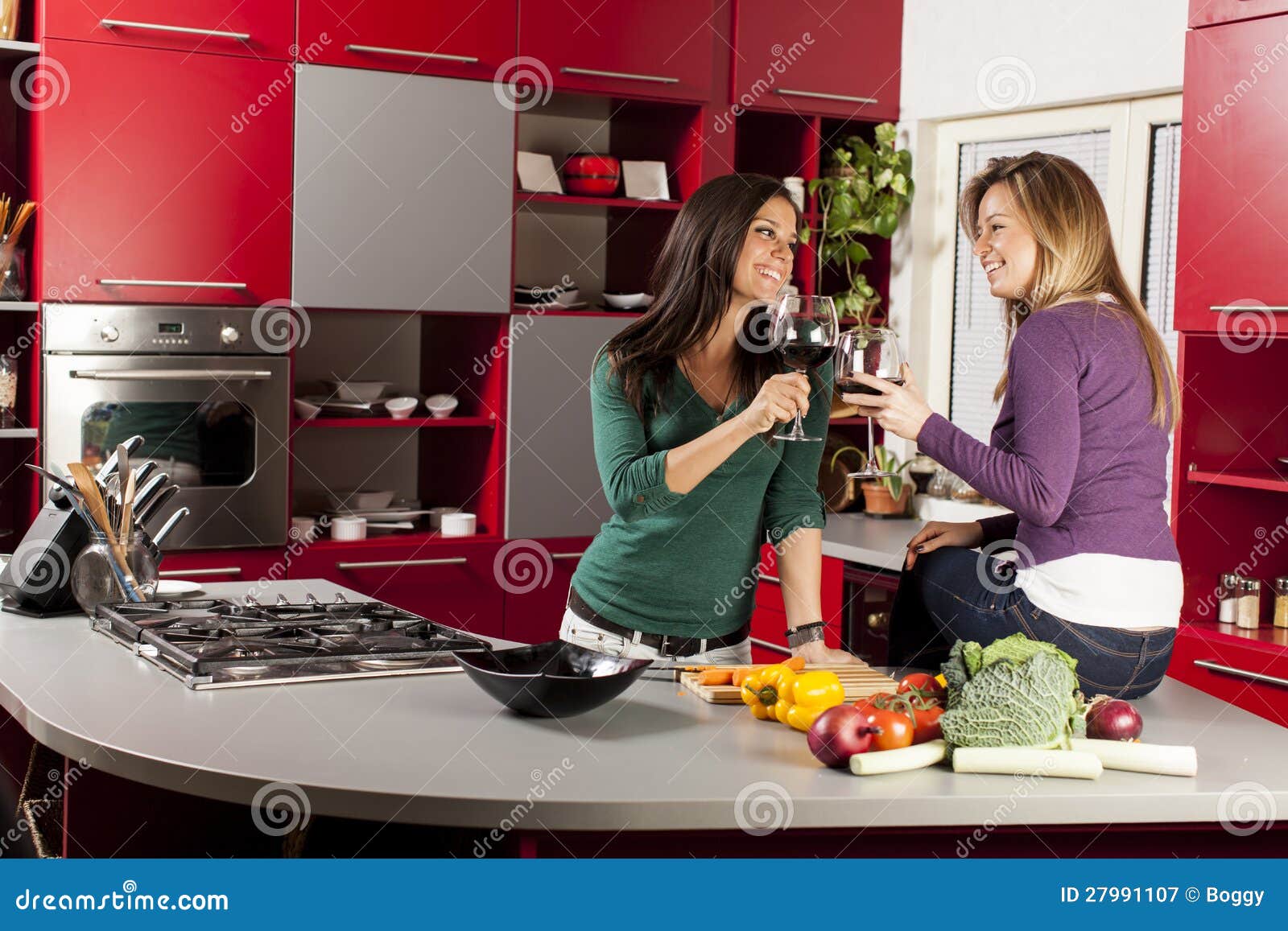 Young women in the kitchen stock image. Image of happy 27991107