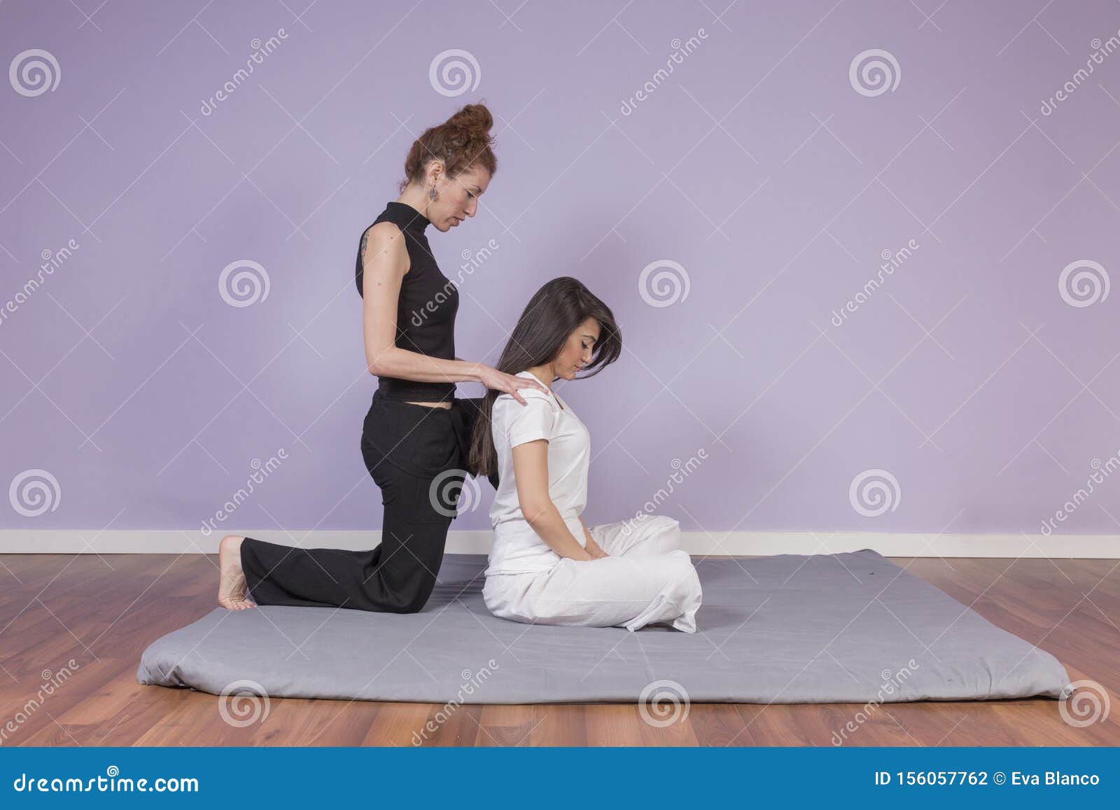 Young Woman Lying While Enjoying Stretching And The Acupressure