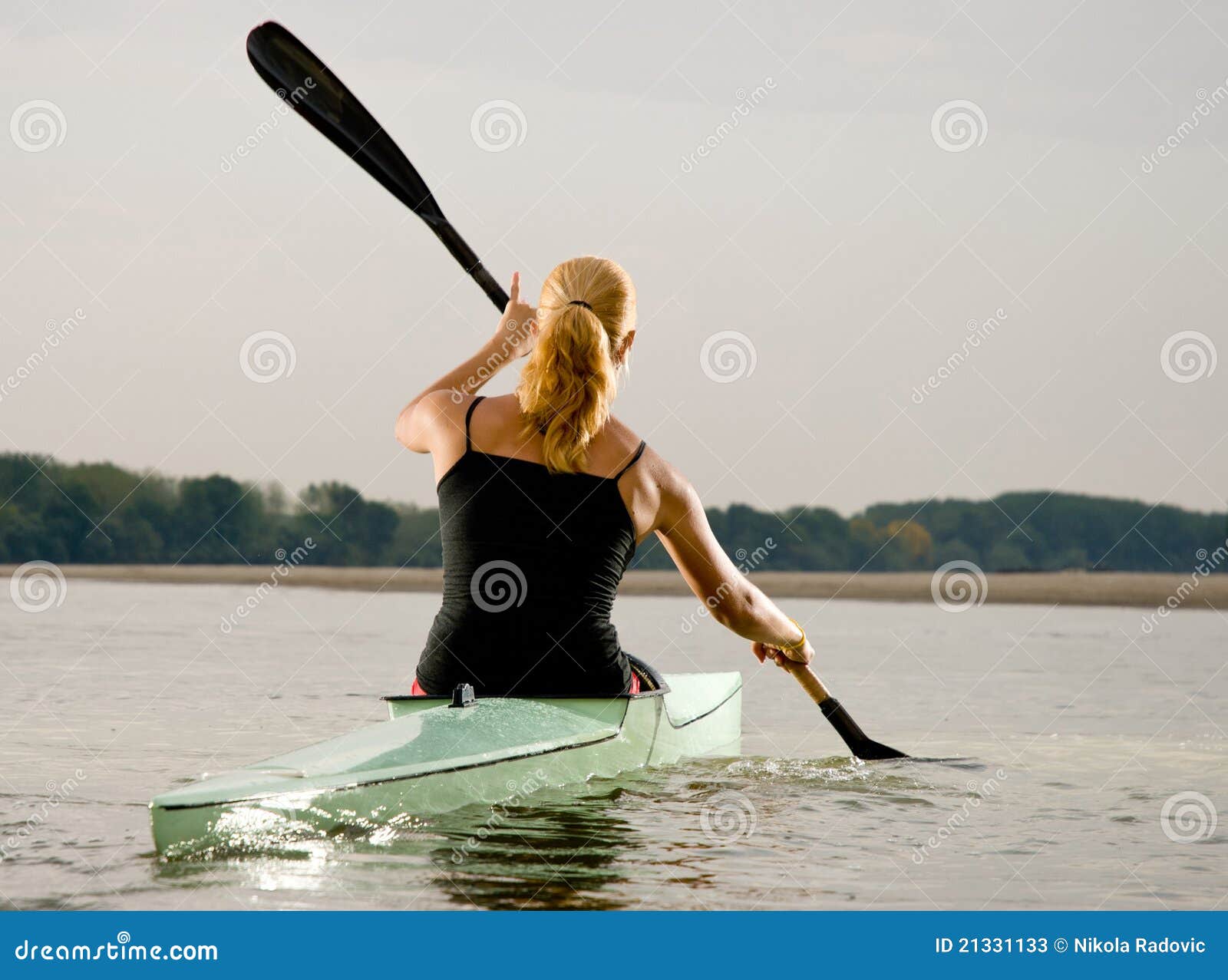 young women paddling in kayak stock image - image of water