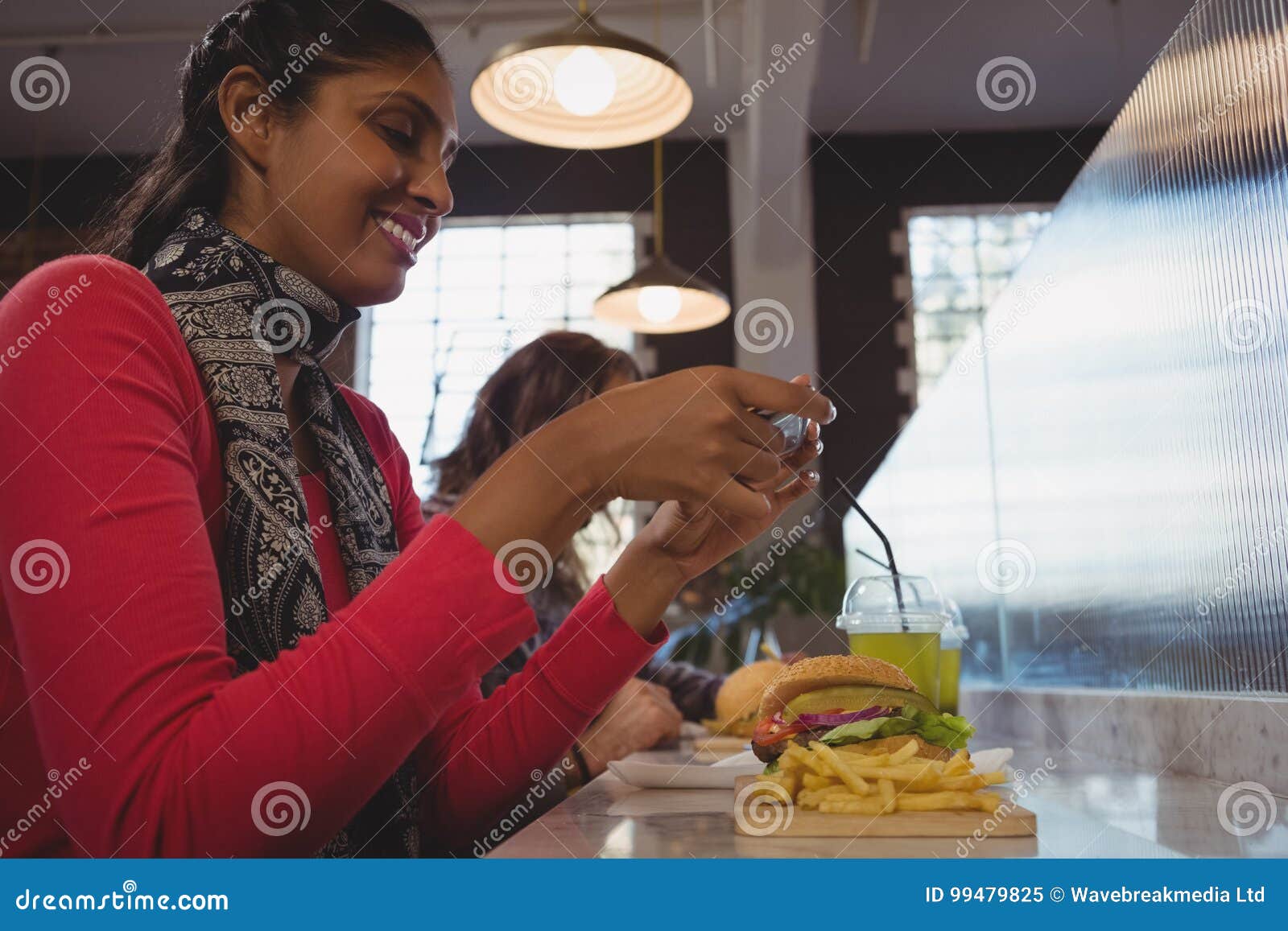 Woman Photographing French Fries in Cafe Stock Image - Image of drink