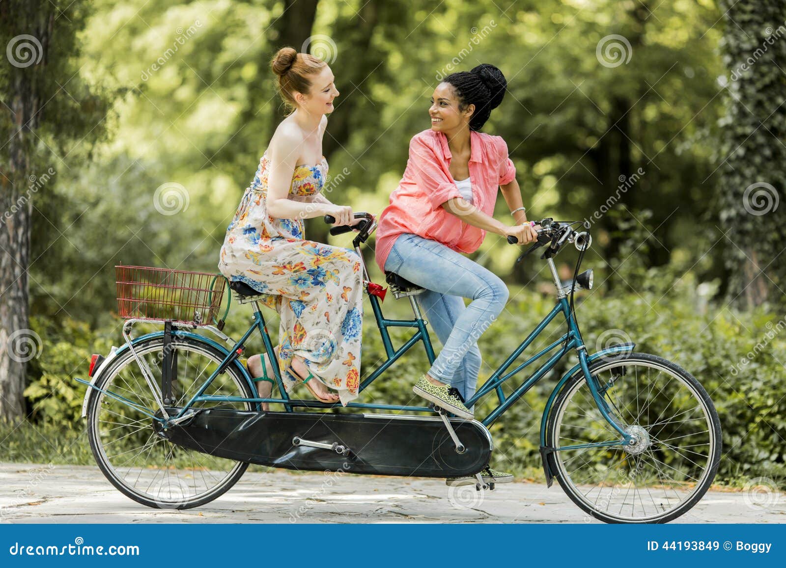 Young Women Riding on the Tandem Bicycle Stock Image Image of