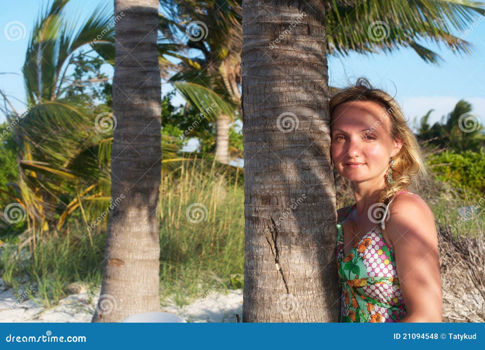 A Young Women is Standing Next To the Palm Tree Stock Photo - Image of ...