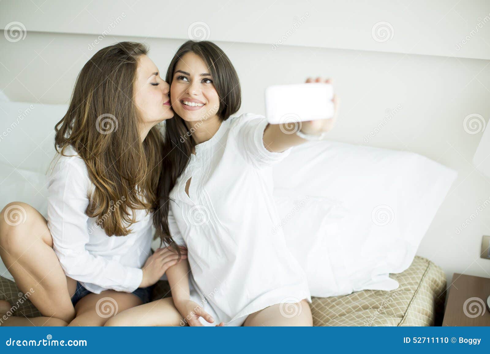 Young Women Taking Selfie in the Bed Stock Photo Image of relax