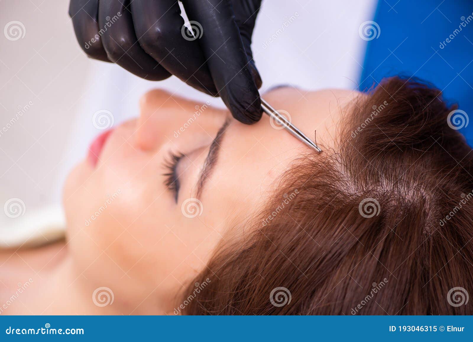 young woman visiting male beautician in hair transplantation con