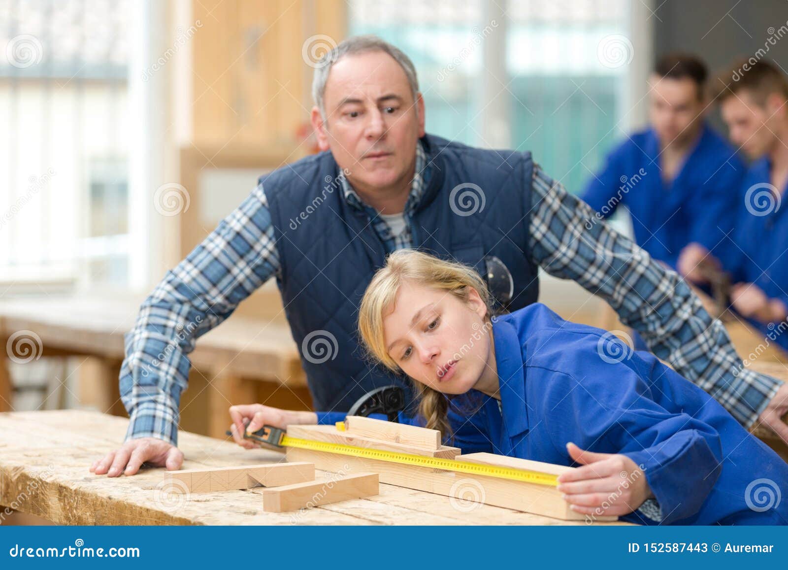 Young Woodworking Apprentice Measuring Wood Stock Image Image of