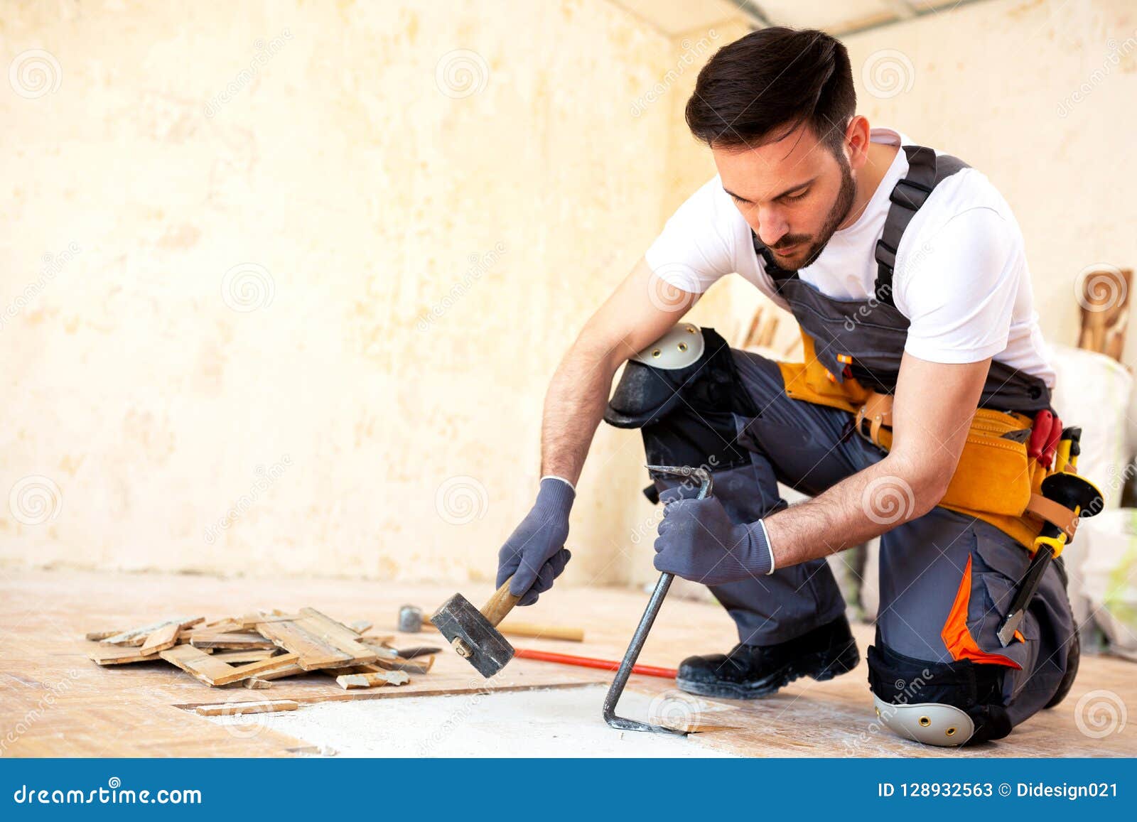 Young Worker Removing Old Flooring Stock Image Image of natural