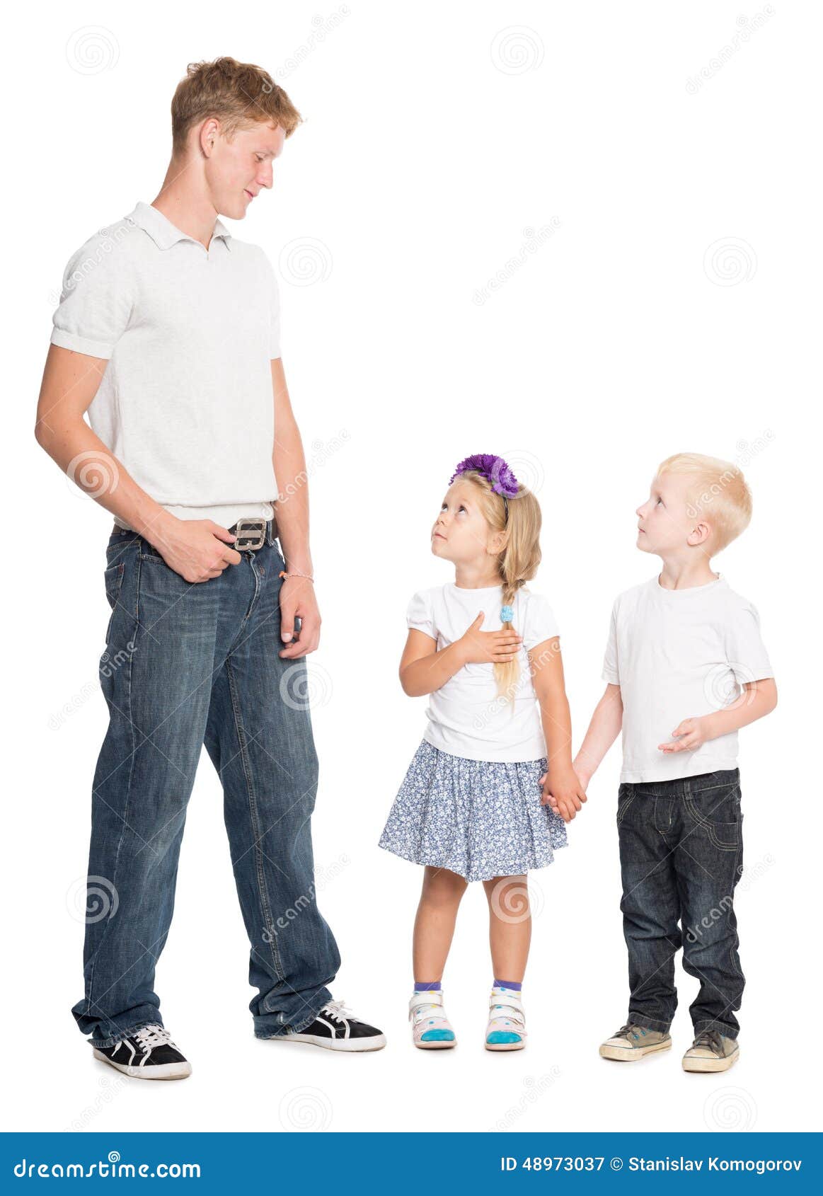 Younger Brother and Sister Look at Older Brother Stock Image ...
