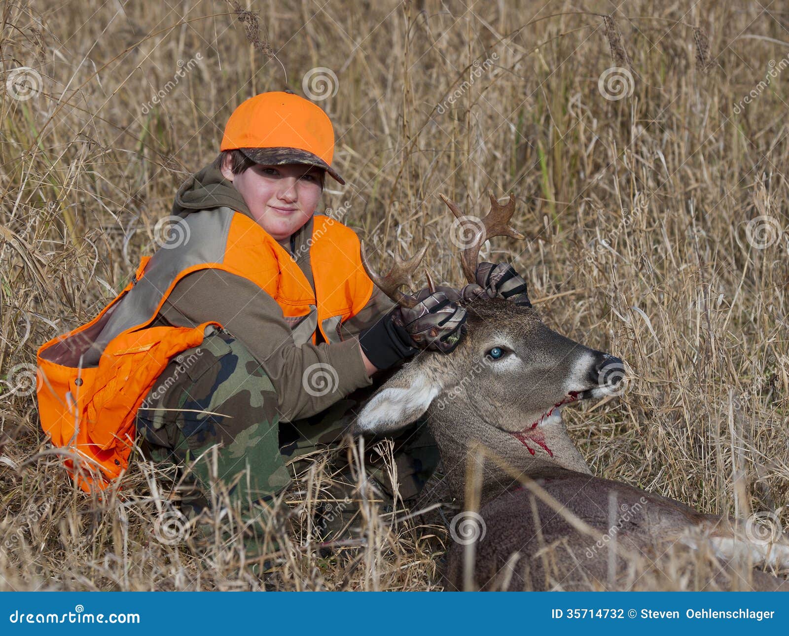 Youth Deer Hunter stock photo. Image of dead, stag, antler 35714732