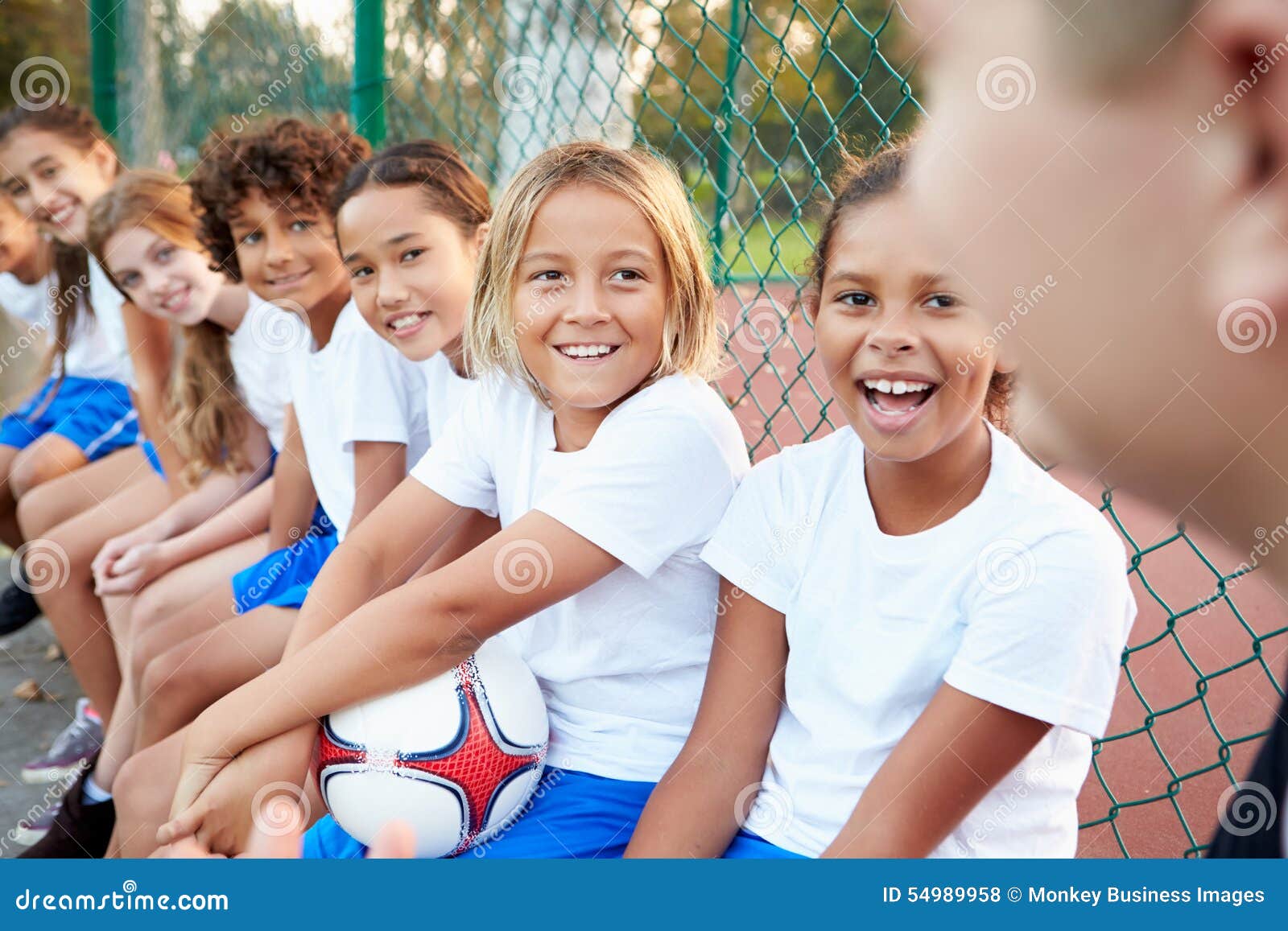 Coach Is Coaching Children Training In Soccer Team Stock Photo, Picture and  Royalty Free Image. Image 65309590.