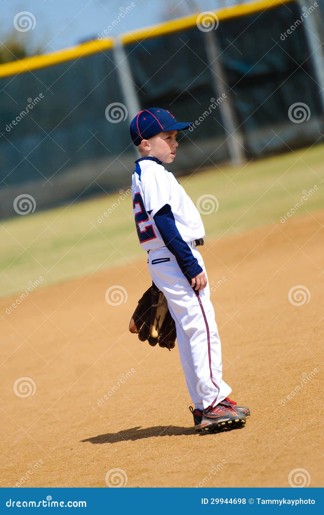 Youth player on field stock photo. Image of jersey, ball 29944698