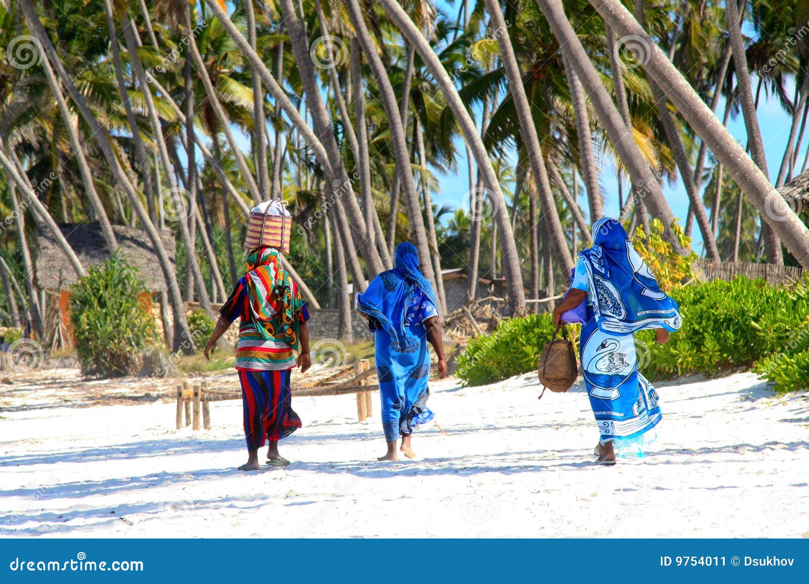 zanzibar women on sandy beach