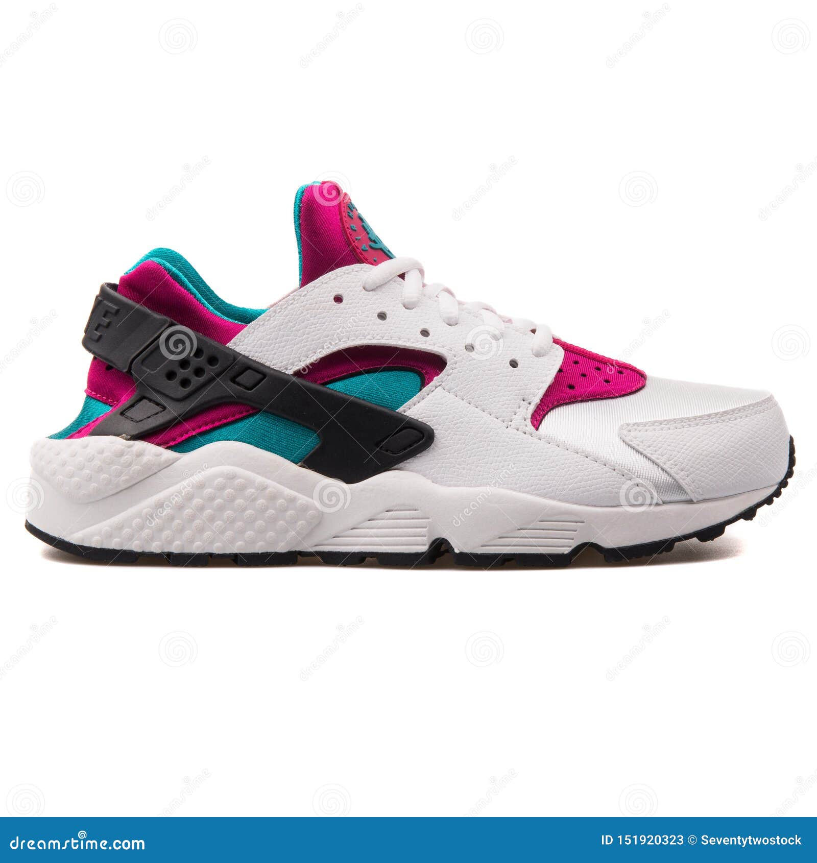 Zapatilla De Blanca, Negra, Verde Y Fucsia De Nike Air Huarache Run Foto de archivo editorial Imagen de calzado, retroceder: