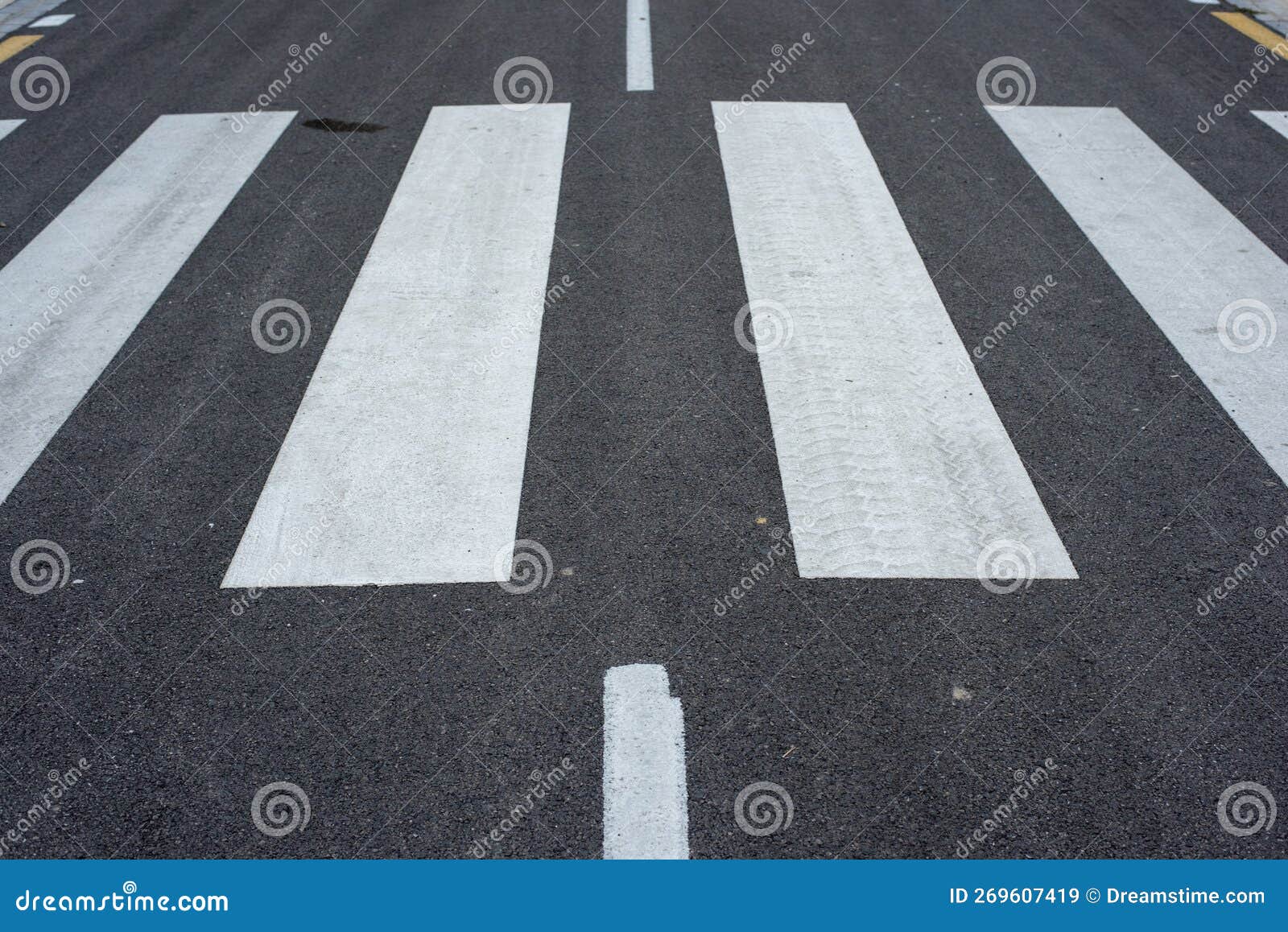 zebra crossing painted on the asphalt of a street