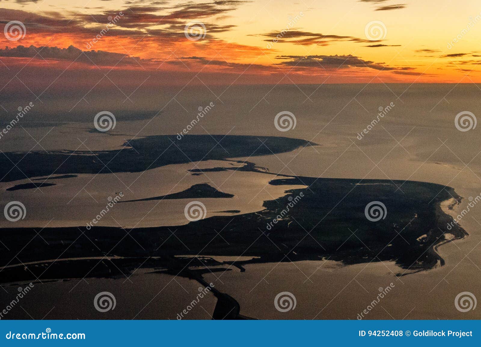Zeeland at Sunset. Impression of the Dutch province of Zeeland, from the air, after sunset.