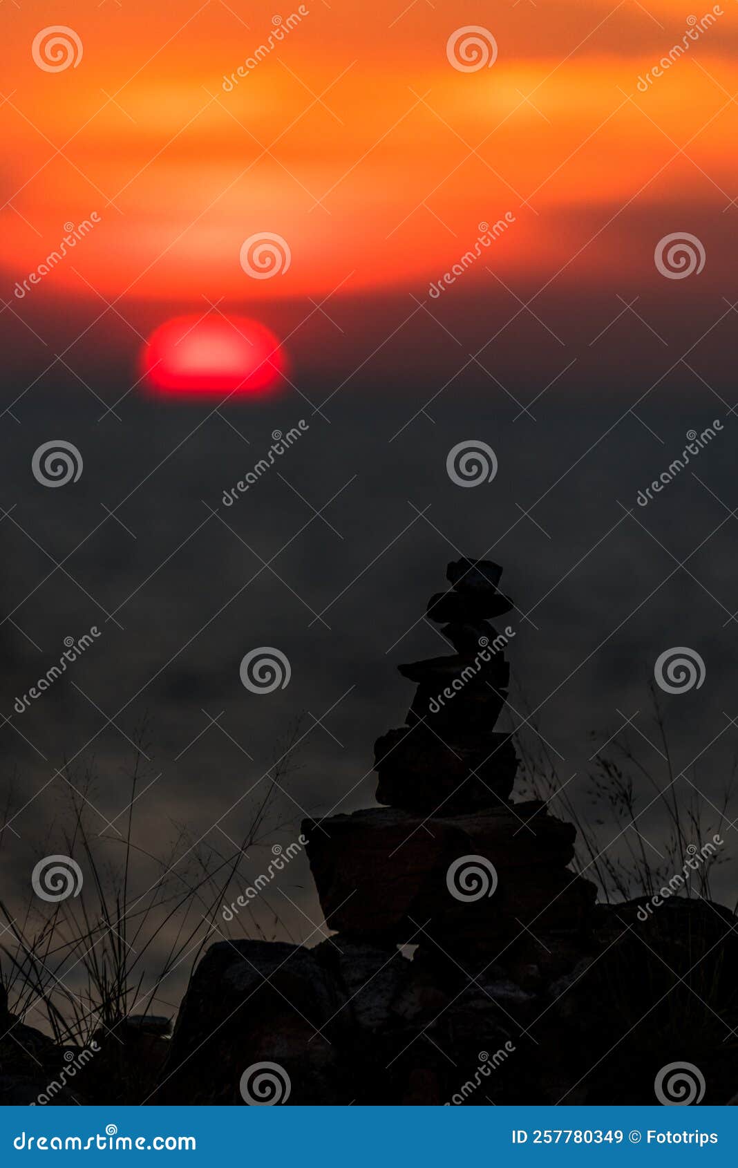 Zen Concept. the Object of the Stones on the Rock at Sunset Stock Image