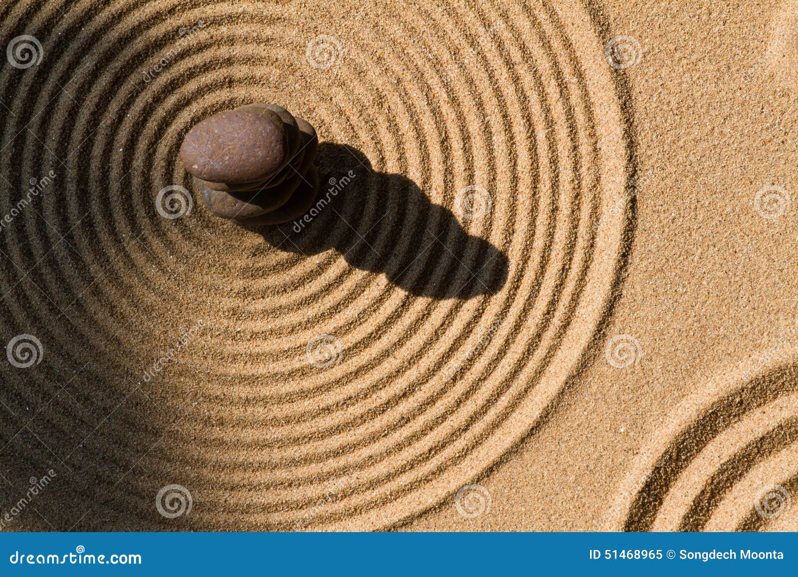 zen rock garden with a pile of stones