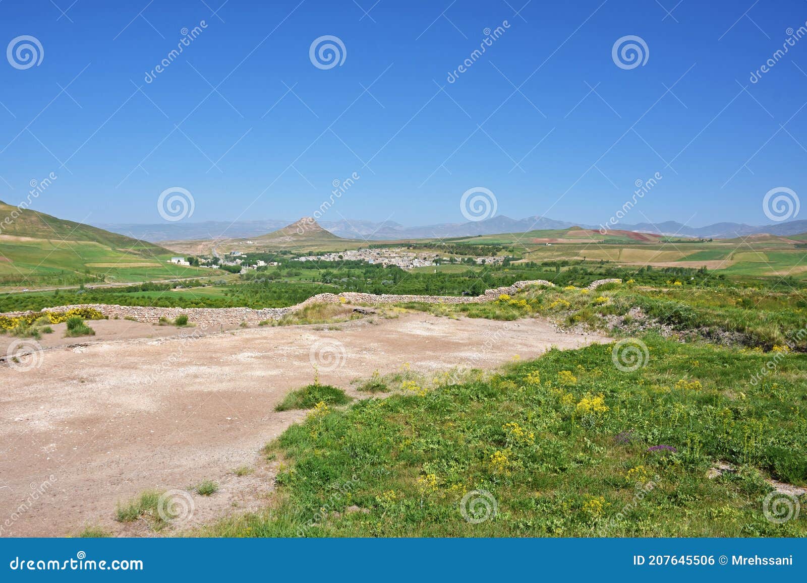 zendan-e soleyman or prison of solomon peak and historical wall of takht-e soleiman in takab