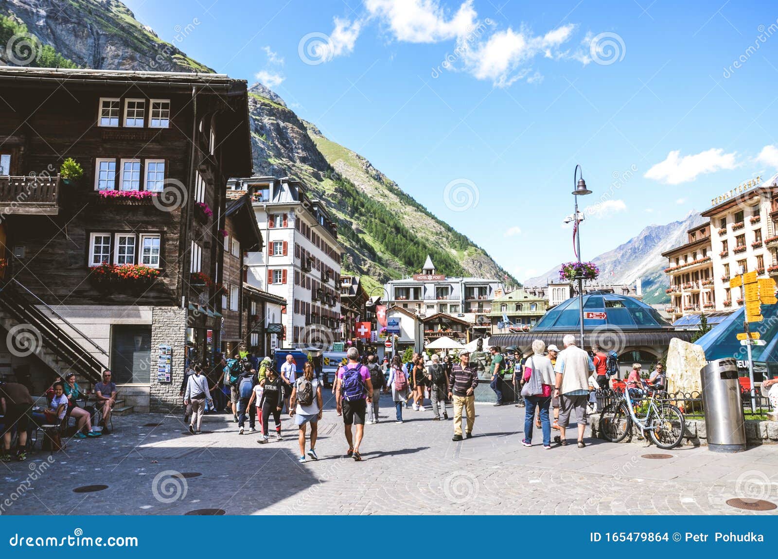 Zermatt, Switzerland July 10, 2019 Street with Tourists in Beautiful
