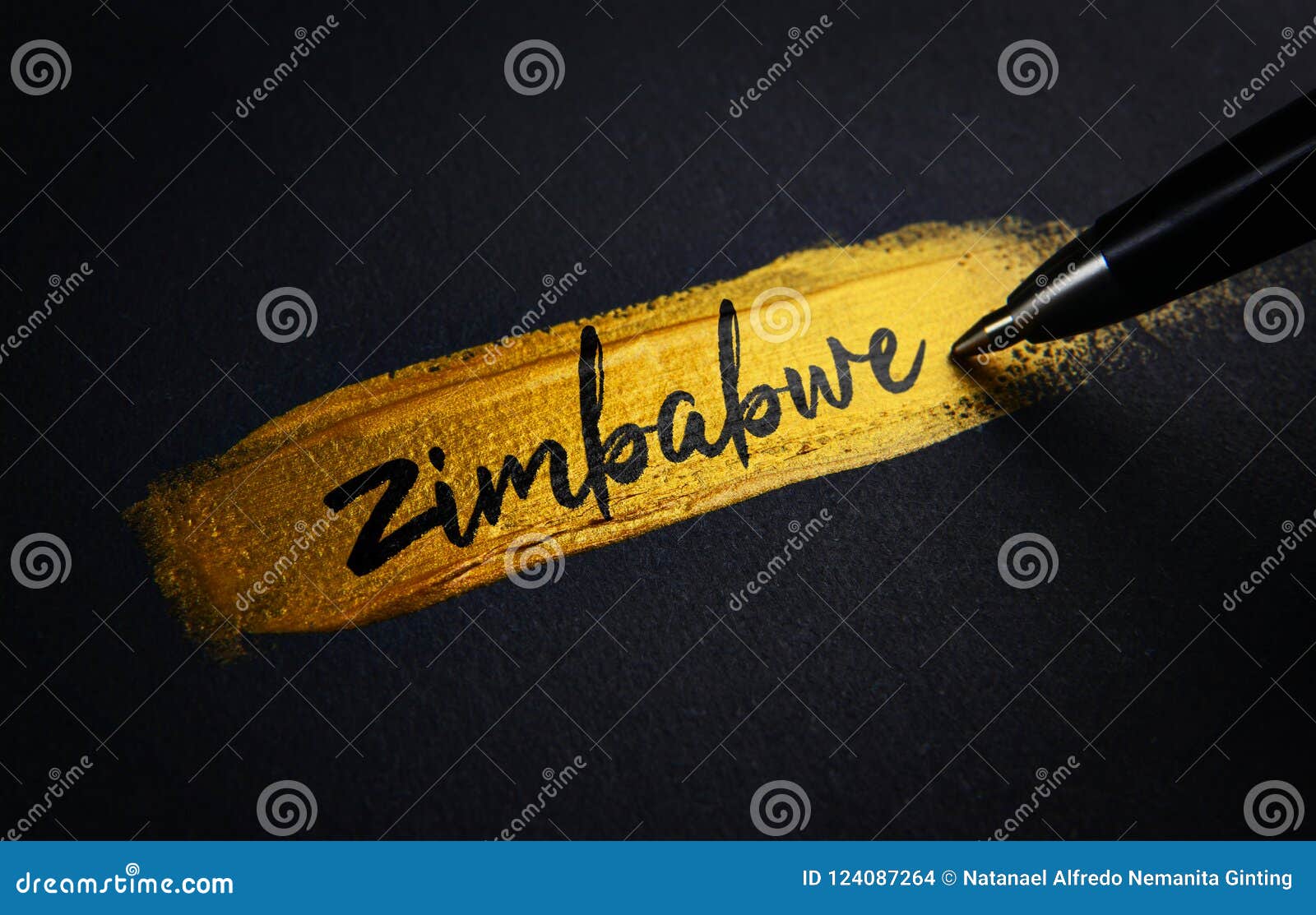 Zimbabwe Handwriting Text on Golden Paint Brush Stroke Stock Photo