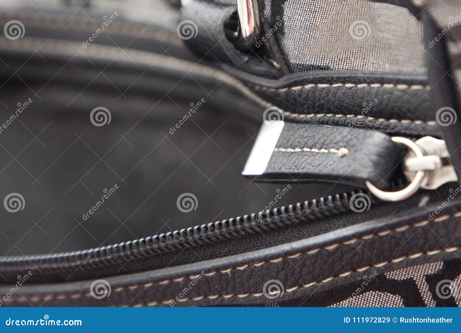 Black zipper on a bag stock image. Image of handbag 111972829