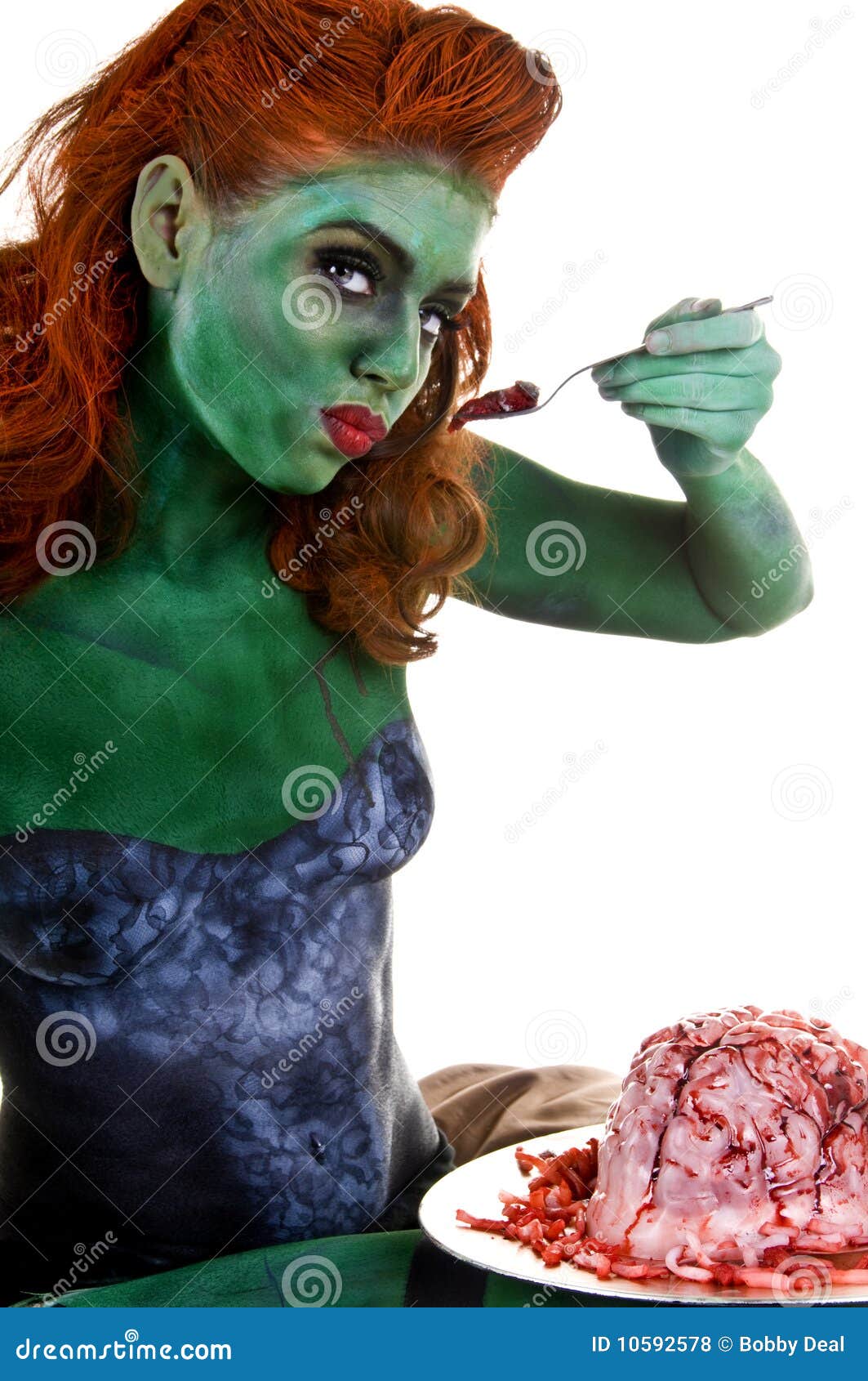 Zombie with Brain on a Silver Plater Stock Photo Image of brains