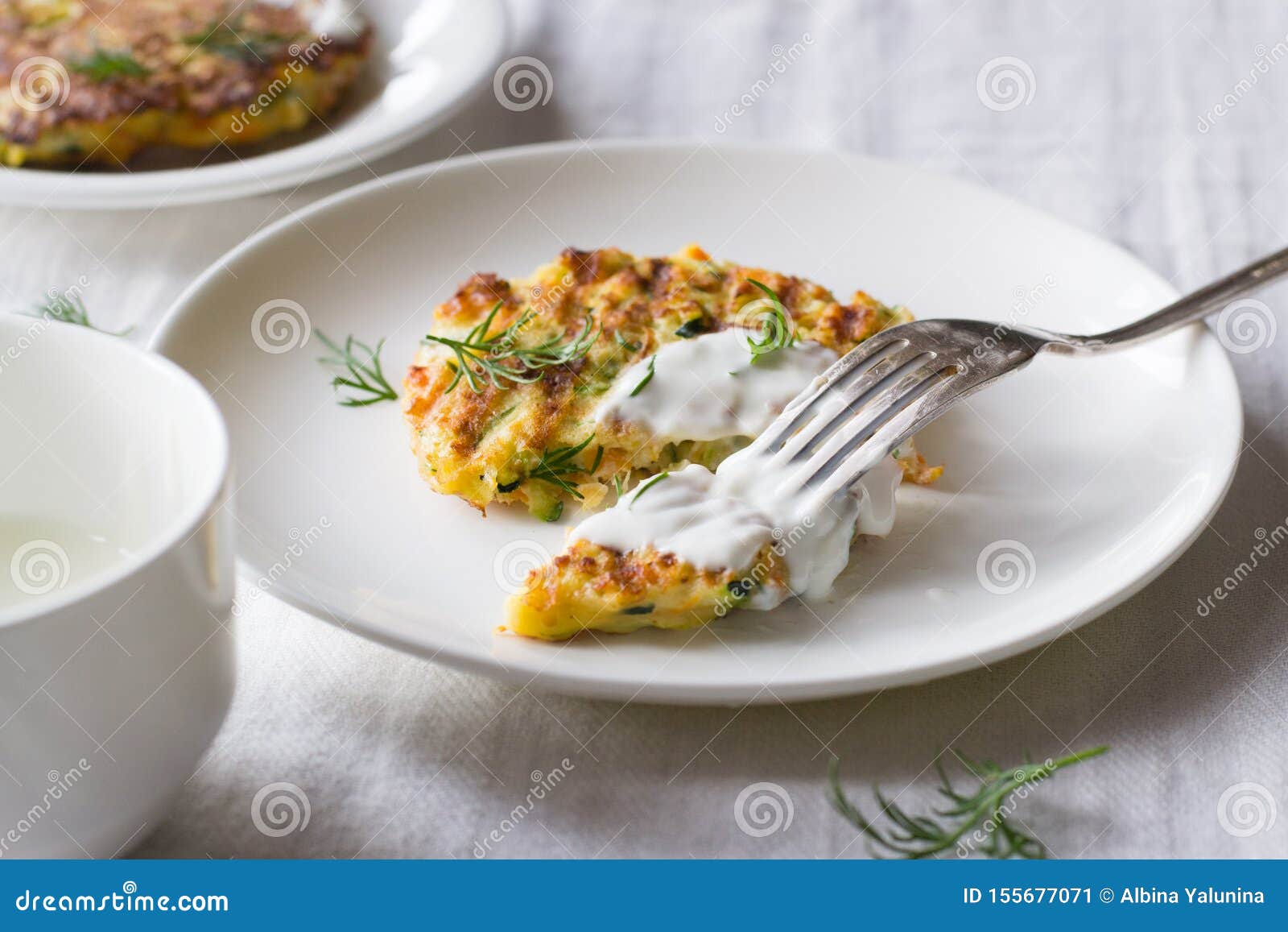zucchini, carrot, parmesan fritters with dill and yogur