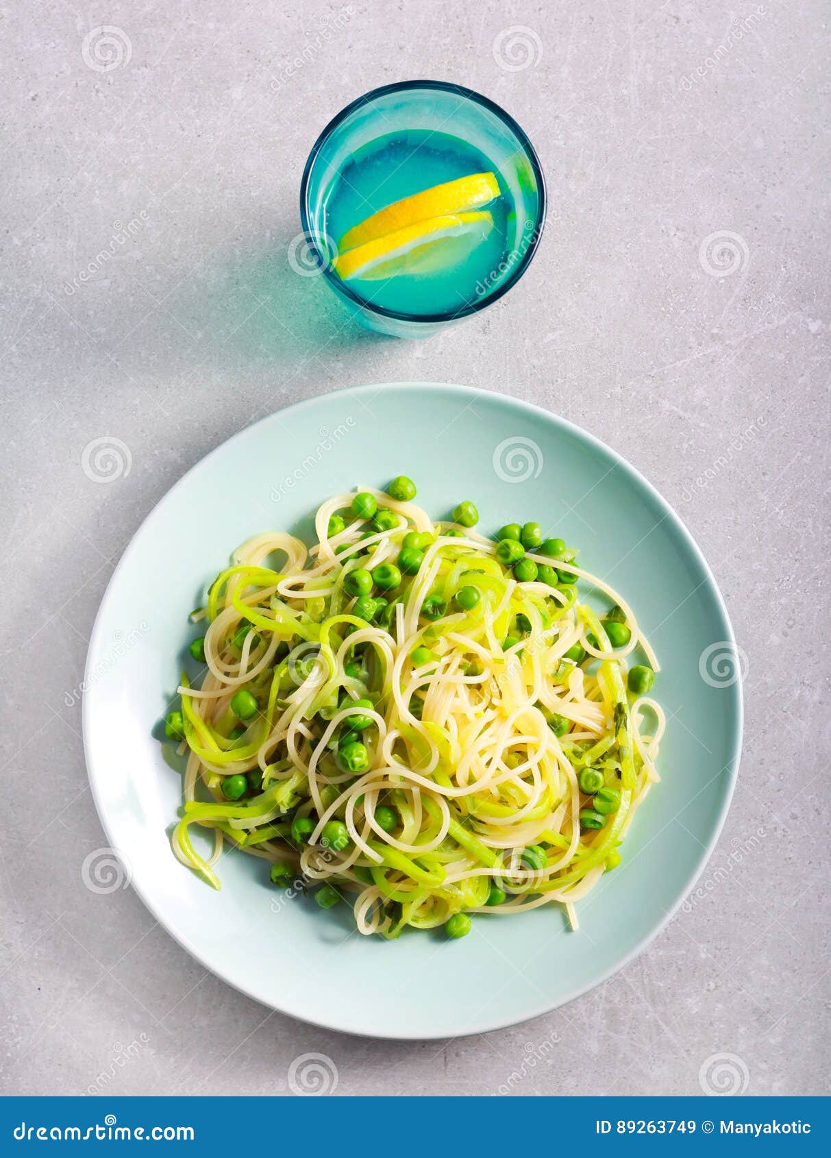 Zucchini and pea spaghetti stock image. Image of courgette 89263749