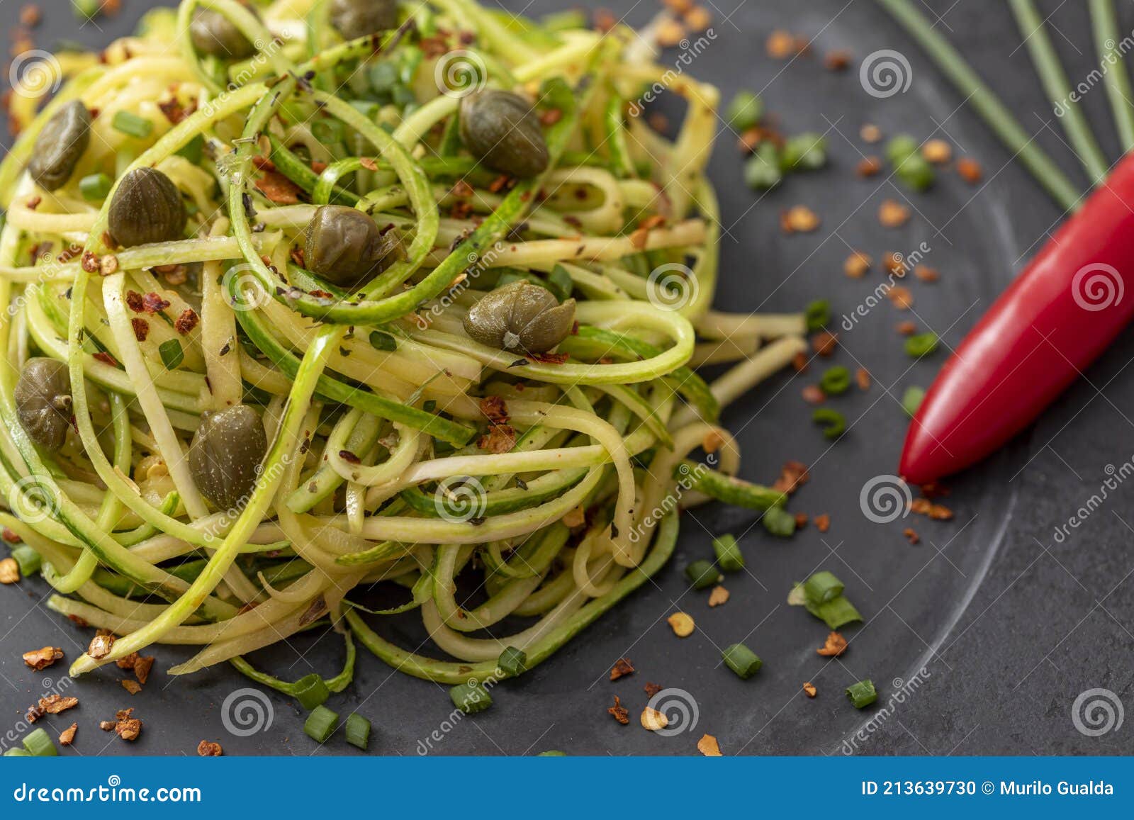Zucchini Spaghetti with Dehydrated Pepperoni Pepper and Capers Stock