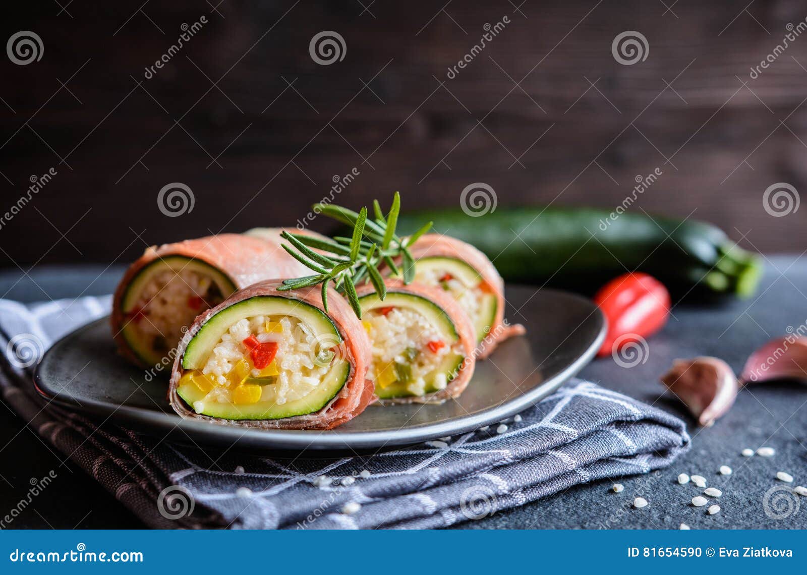 Zucchini Stuffed with Rice, Cheese, Pepper and Wrapped in Prosciutto
