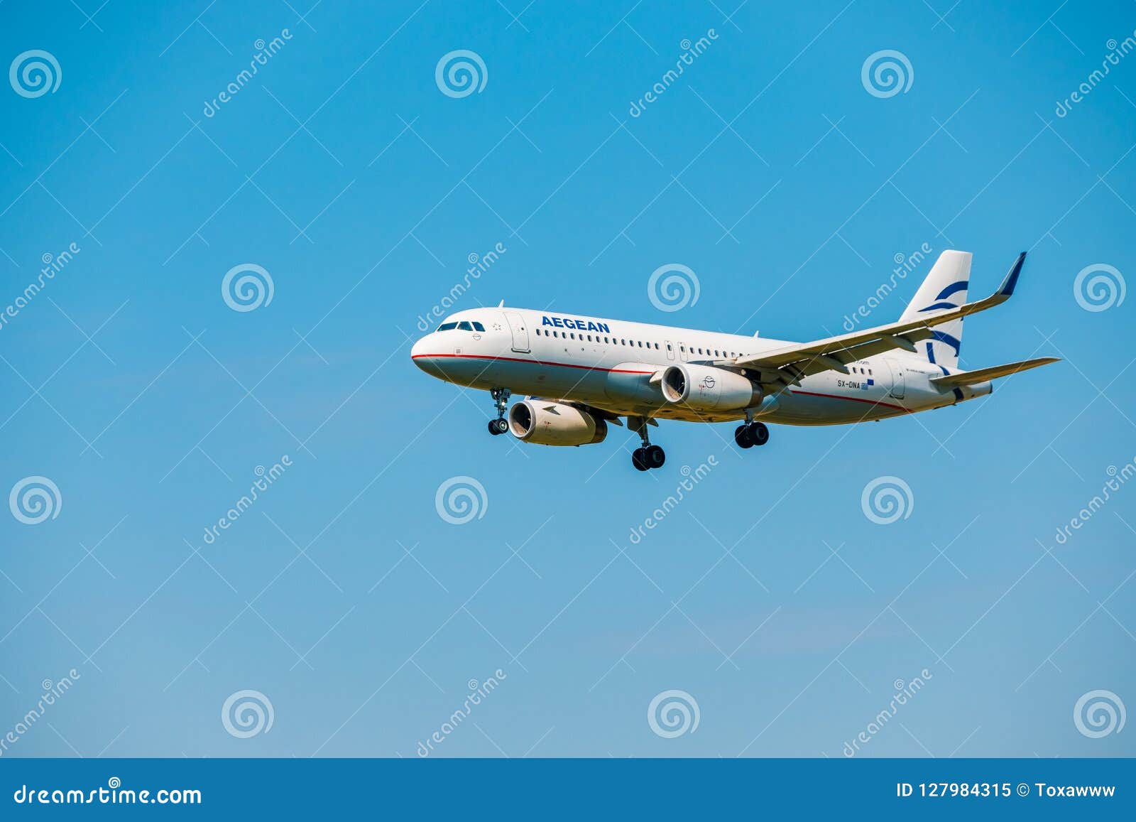 Aegean Airlines Airplane Preparing For Landing At Day Time