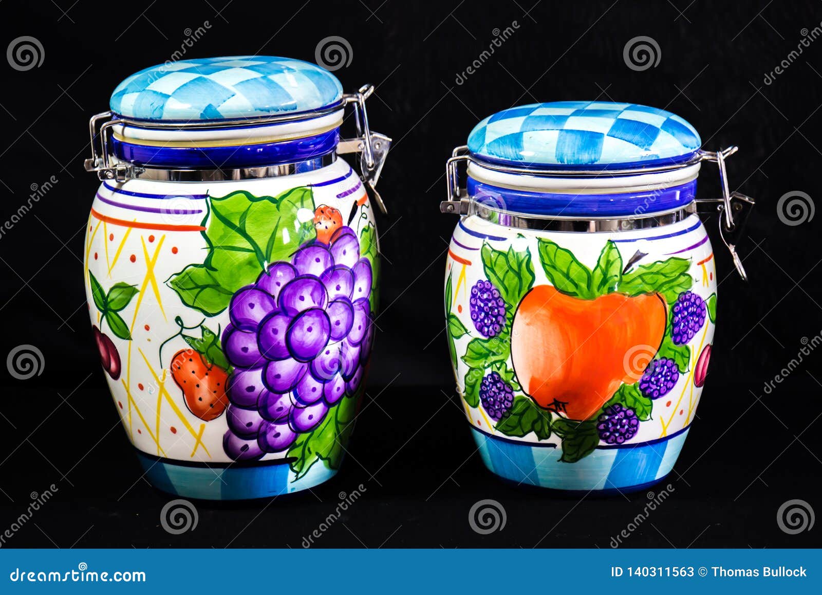 Zwei Dekorative Küchen-Behälter Mit Der Frucht Gemalt Auf