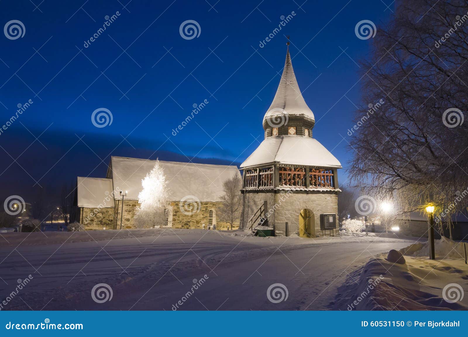 Ãâ¦re medieval church and belltower wintertime evening