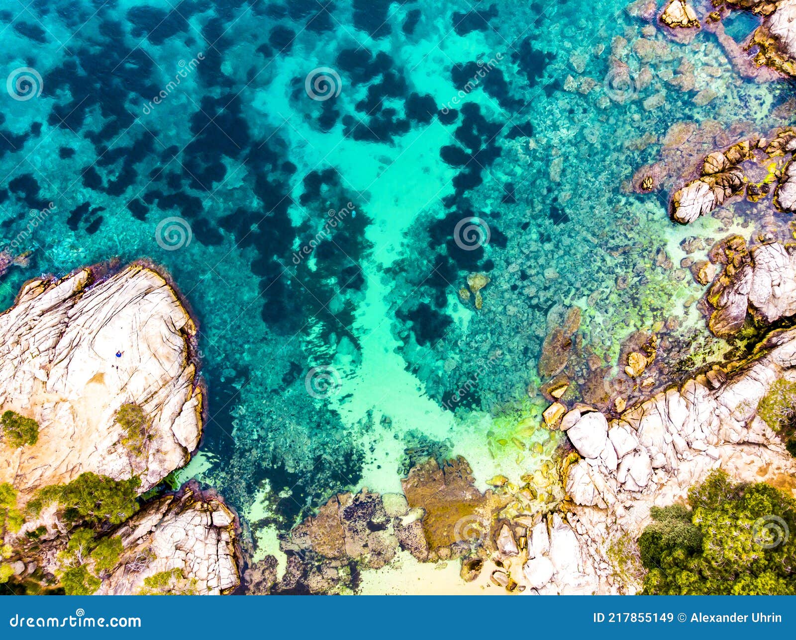 ÃÂerial view. rocks on the coast of lloret de mar in a beautiful summer day,sandy beach, costa brava, catalonia, spain.