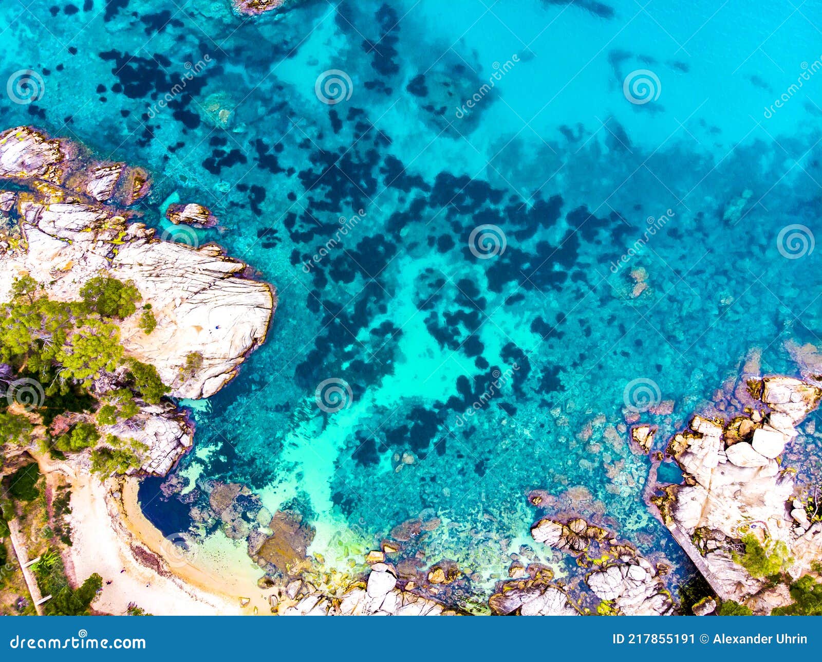 ÃÂerial view. rocks on the coast of lloret de mar in a beautiful summer day,sandy beach, costa brava, catalonia, spain.