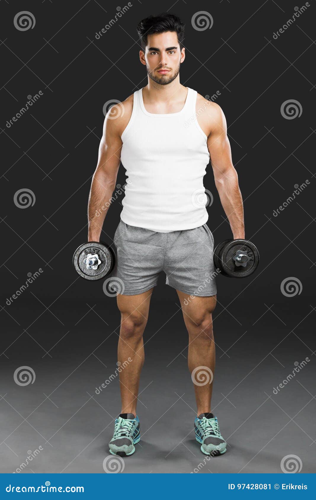 атлетические поднимаясь весы человека Стоковое Изображение .