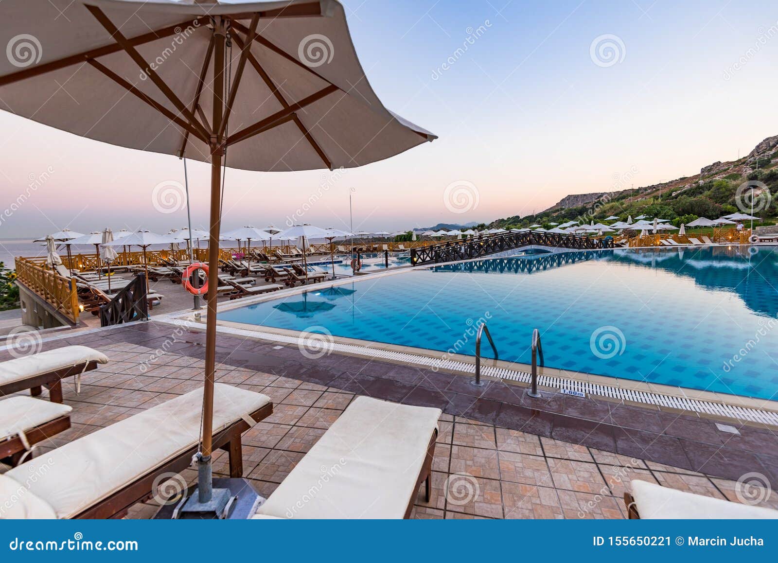 Ð Ð°ÑÑÐ»Ð°Ð±Ð»ÑÑŽÑ‰Ð¸Ð¹ Ð¿Ð¾Ð»Ð» Ð² Ð¾Ñ‚ÐµÐ»Ðµ Resort at Sunrise, Rhodes Island, Ð“Ñ€ÐµÑ†Ð¸Ñ. ÐžÑ‚Ð´Ð¾Ñ…Ð½Ð¸Ñ‚Ðµ Ð² Ð¾Ñ‚ÐµÐ»Ðµ Resort at Sunrise, Rhodes Island, Ð“Ñ€ÐµÑ†Ð¸Ñ, Ñ„Ð¾Ð½, ÐºÑ€Ð°ÑÐ¸Ð²Ñ‹Ð¹, Ð³Ð¾Ð»ÑƒÐ±Ð¾Ð¹, ÑÐ¸Ð½Ð¸Ð¹, Ñ‡Ð°Ñ, ÑÑ‚ÑƒÐ», ÐºÐ¾Ð¿Ð¸Ñ, Ð¿Ñ€Ð¾ÑÑ‚Ñ€Ð°Ð½ÑÑ‚Ð²Ð¾, Ñ€Ð°ÑÑÐ²ÐµÑ‚, ÐºÑ€ÐµÑÐ»Ð¾-ÐºÐ°Ñ‚Ð°Ð»ÐºÐ°, ÑÐ»ÐµÐ³Ð°Ð½Ñ‚Ð½Ñ‹Ð¹, Ð²ÐµÑ‡ÐµÑ€, Ð²Ð½ÐµÑˆÐ½Ð¸Ð¹, Ð·ÐµÐ»ÐµÐ½Ñ‹Ð¹, Ð¾Ñ‚Ð¿ÑƒÑÐº, Ð¸Ð´Ð¸Ð»Ð»Ð¸Ñ‡ÐµÑÐºÐ¸Ð¹, Ð¾ÑÐ²ÐµÑ‰Ñ‹Ð¹, ÐºÐ°Ñ‚ÐµÑ, Ð¾Ñ‚Ð´Ñ‹Ñ…, Ñ€Ð¾ÑÐºÐ¾ÑˆÑŒ, Ñ€Ð¾ÑÐºÐ¾ÑˆÑŒ, Ð¾ÐºÐµÐ°Ð½, Ð¾Ñ‚ÐºÑ€Ñ‹Ñ‚Ñ‹Ð¹, Ñ€Ð¾Ð·Ð¾Ð²Ñ‹Ð¹, Ð¿Ñ€ÑƒÐ´, Ð±Ð°ÑÑÐµÐ¹Ð½, Ð±Ð°ÑÑÐµÐ¹Ð½, Ð±Ð°ÑÑÐµÐ¹Ð½, ÑƒÐºÑ€Ñ‹Ñ‚Ð¸Ðµ, Ð¾Ñ‚Ð´Ñ‹Ñ…, Ñ€Ð¾Ð´Ð¾Ñ, Ð½ÐµÐ±Ð¾, Ð»ÐµÑ‚Ð¾, Ð·Ð°ÐºÐ°Ñ‚, Ð¿Ð»Ð°Ð²Ð°Ð½Ð¸Ðµ, Ñ‚Ñ€Ð°Ð½ÐºÐ²Ð¸Ð»ÑŒ, Ð¿ÑƒÑ‚ÐµÑˆÐµÑÑ‚Ð²Ð¸Ðµ, Ð·Ð¾Ð½Ñ‚, Ð¾Ñ‚Ð´Ñ‹Ñ…, Ð²Ð¸Ð´