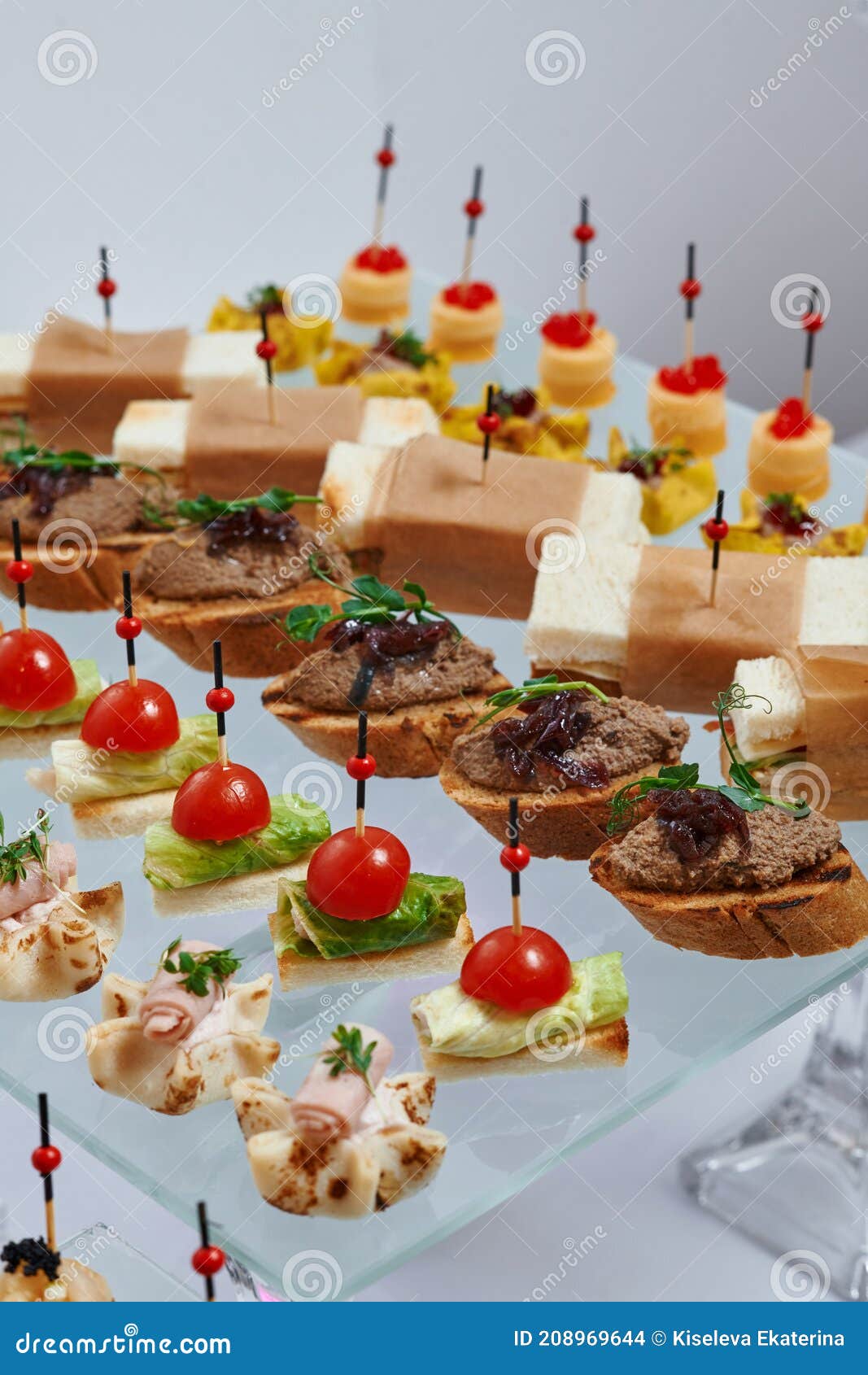 Ð¡atering. Banquet Table with Different Snacks and Desserts. Stock