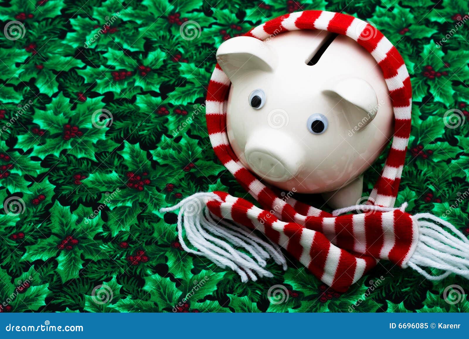 сбережения рождества. шарф листьев падуба зеленого цвета рождества ягоды банка предпосылки веселый piggy striped носить