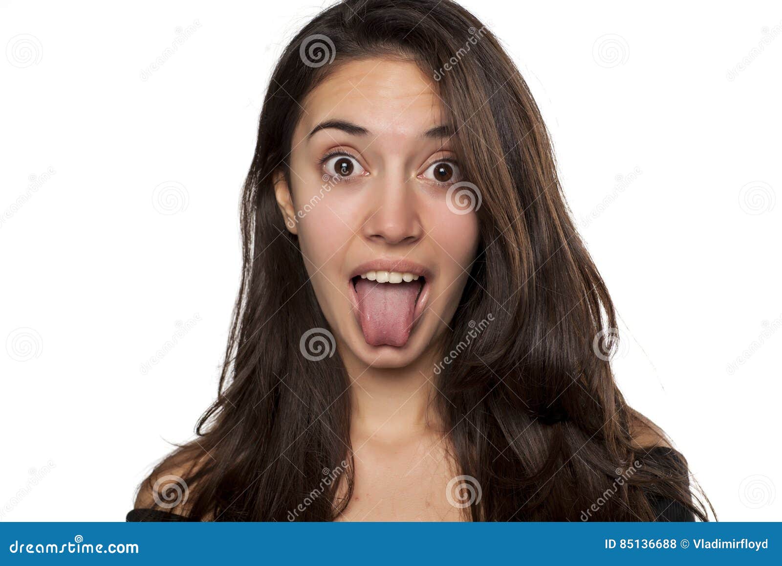 眯着眼吐舌头的傻女人照片摄影图片_ID:154604025-Veer图库