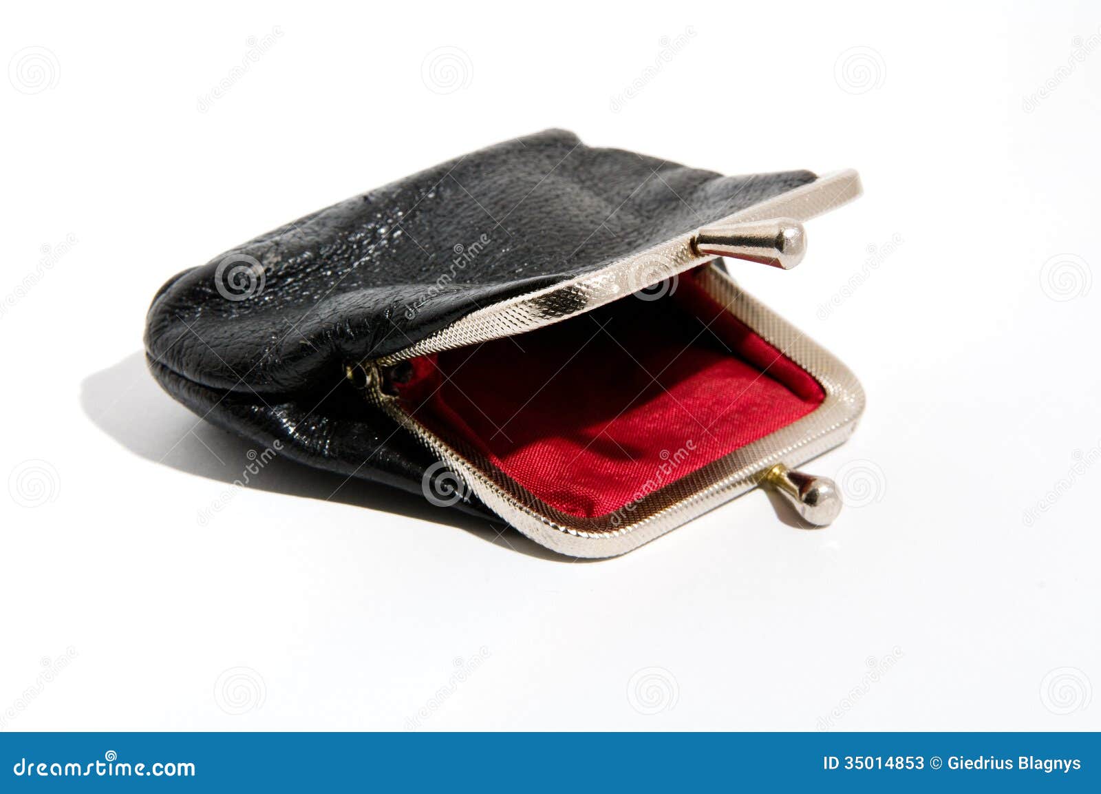 拿着一个空钱包的女人，她没有钱照片摄影图片_ID:158348783-Veer图库