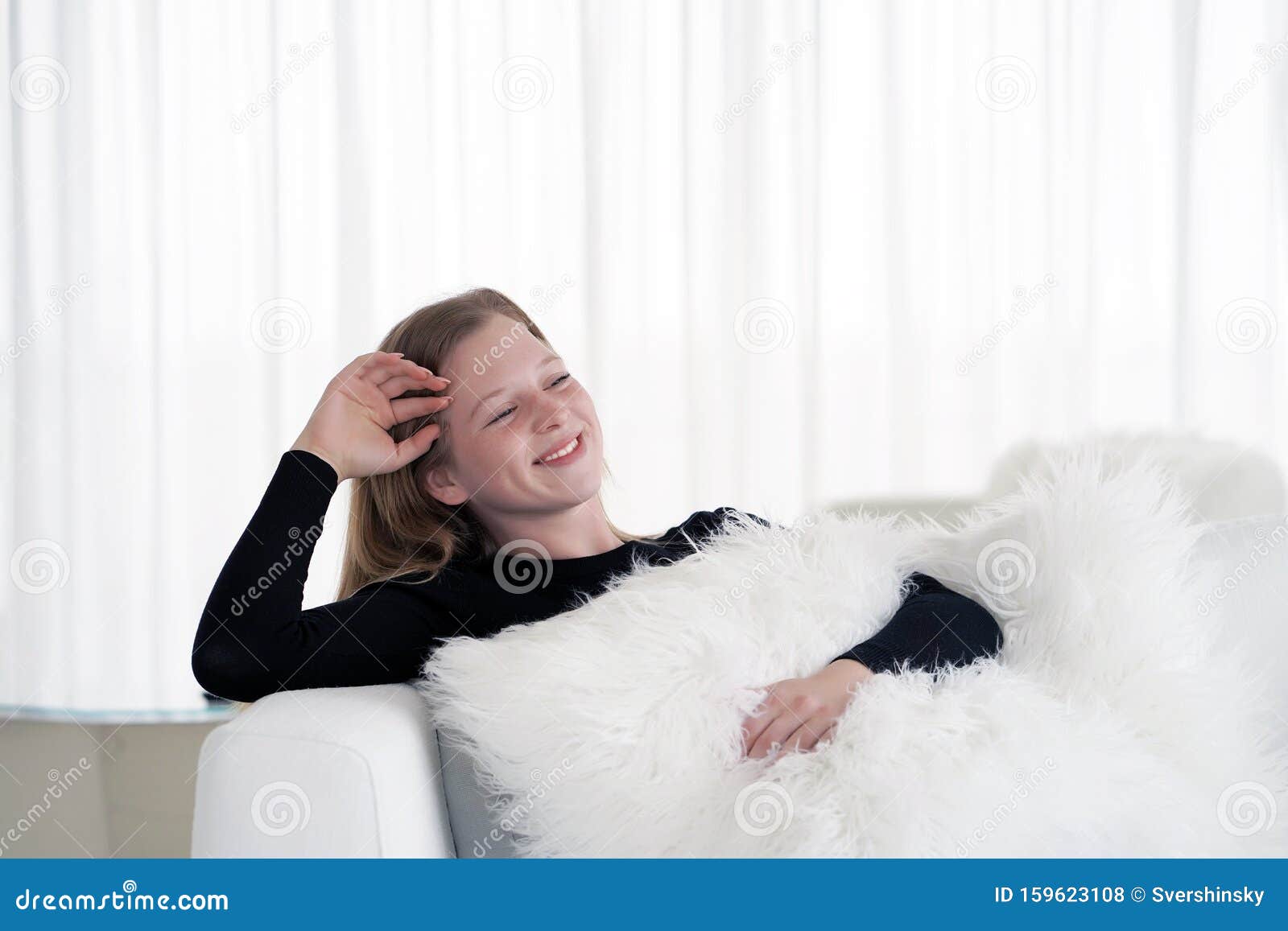 A Woman Lying On A Sofa Shopping Online Picture And HD Photos | Free ...