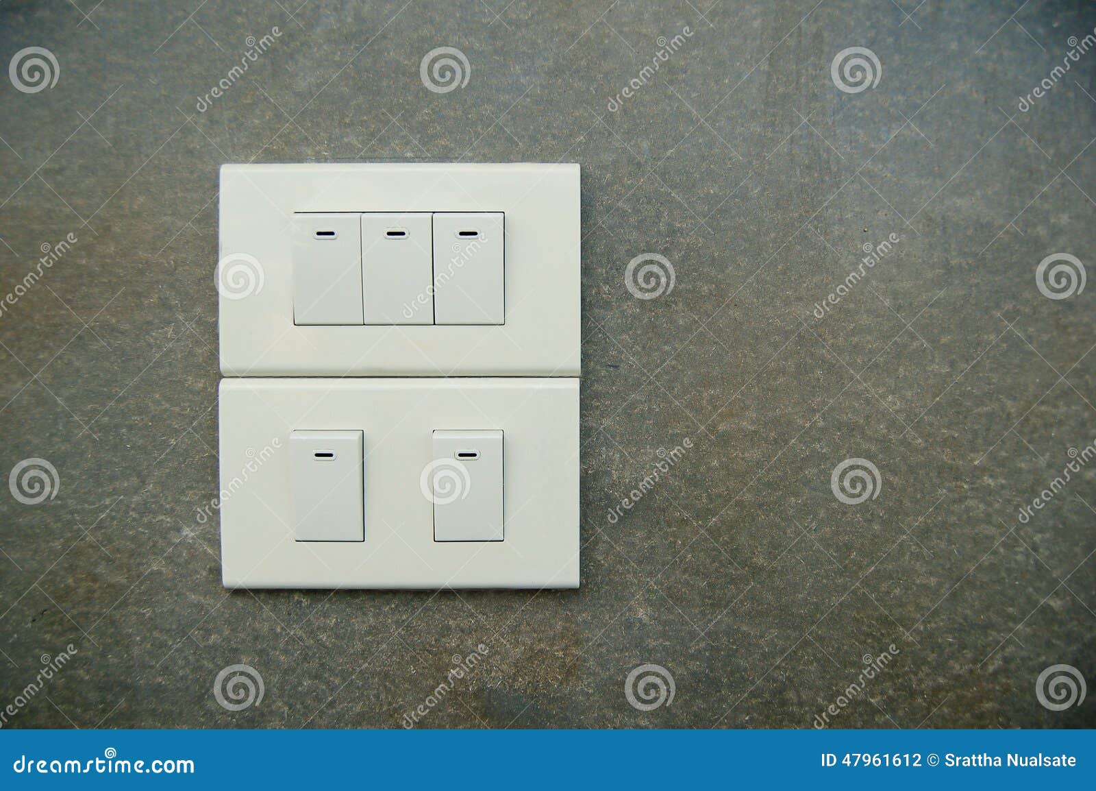 在表面水泥的灯开关在泰国